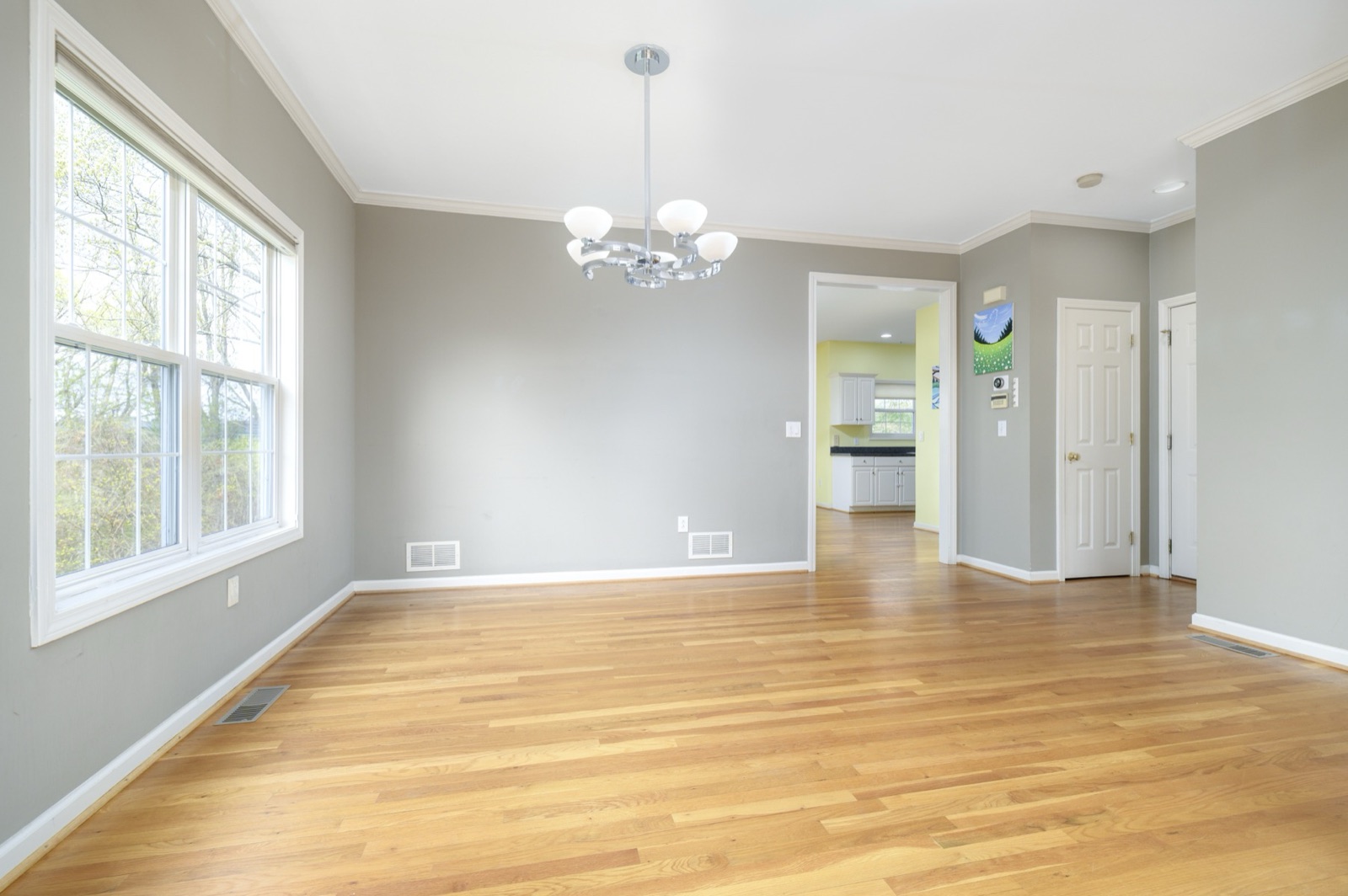 Empty Norwalk CT open-plan dining area before virtual staging