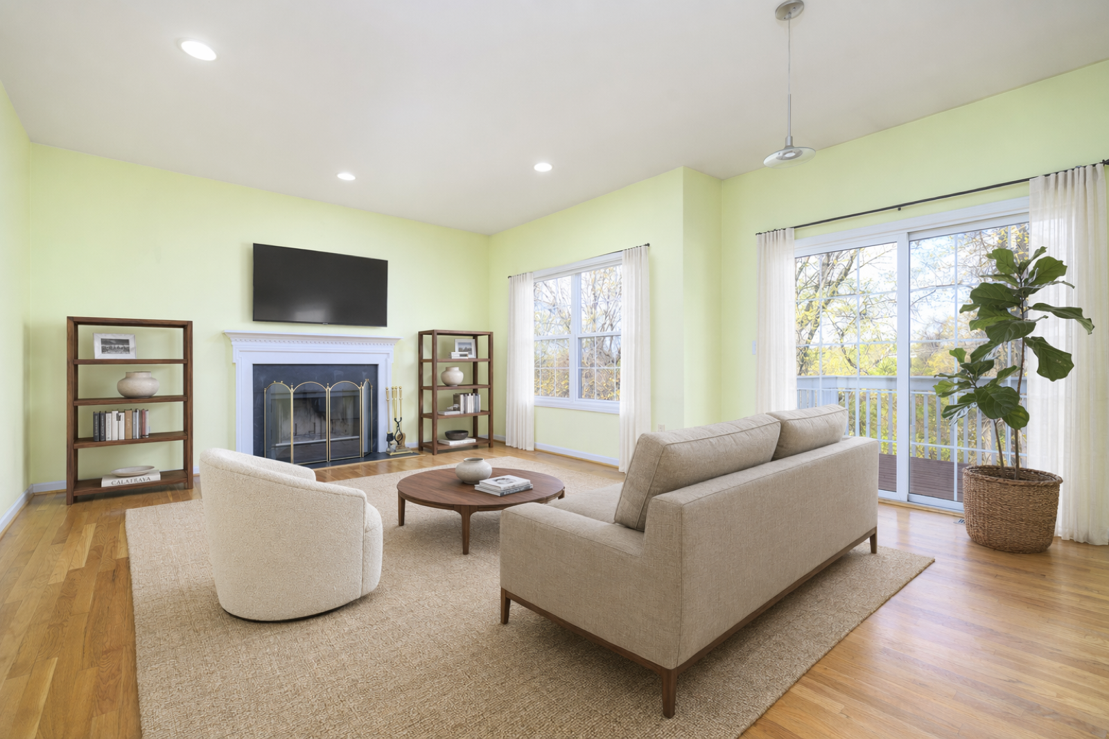 Norwalk CT family room after virtual staging with sectional and warm neutrals