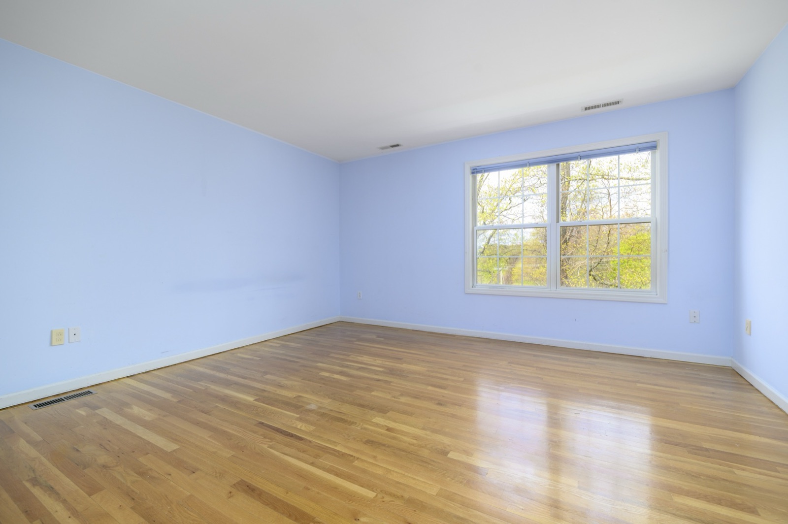 Empty Norwalk CT primary bedroom before virtual staging